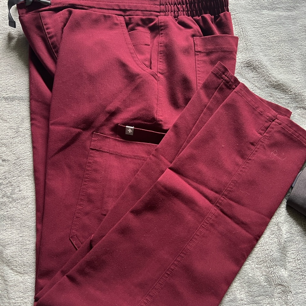 Figs Burgundy skinny yola pants.